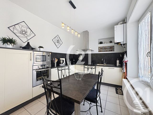 Afficher la photo en grand Appartement T5 à vendre - 5 pièces - 113.94 m2 - BELFORT - 90 - FRANCHE-COMTE - Century 21 Agence Du Théâtre