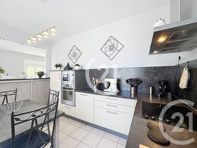 Afficher la photo en grand Appartement T5 à vendre - 5 pièces - 113.94 m2 - BELFORT - 90 - FRANCHE-COMTE - Century 21 Agence Du Théâtre