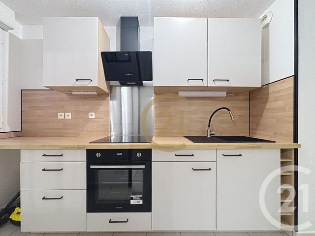 Appartement T3 à louer - 3 pièces - 64.87 m2 - BELFORT - 90 - FRANCHE-COMTE - Century 21 Agence Du Théâtre